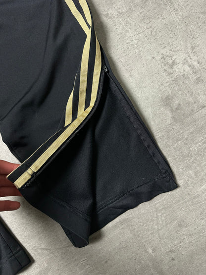BLACK/GOLD VINTAGE ADIDAS FIREBIRD TRACKPANTS - 2000s - M