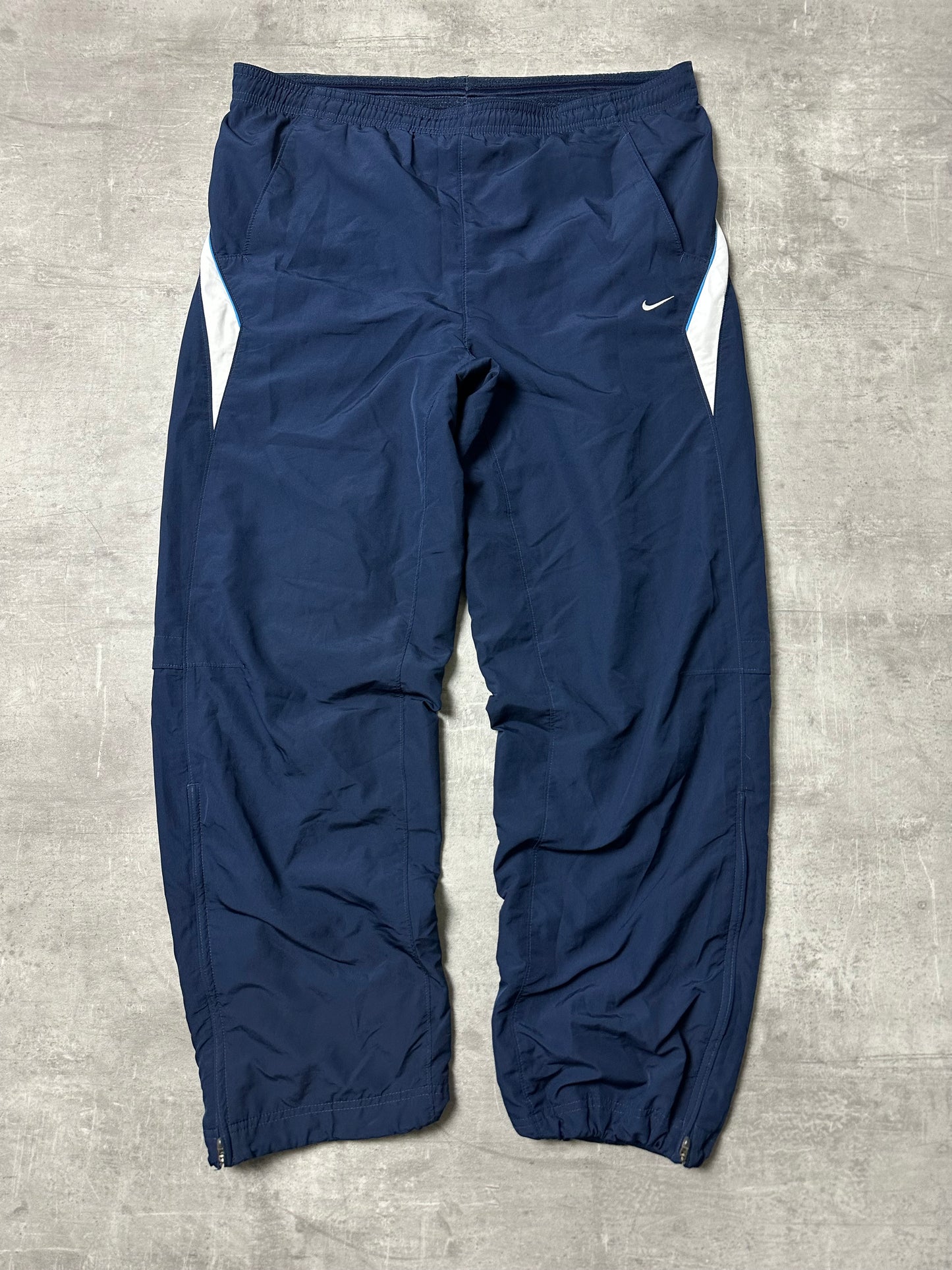 BLUE/WHITE VINTAGE NIKE BAGGY TRACKPANTS - 2000s - M/L